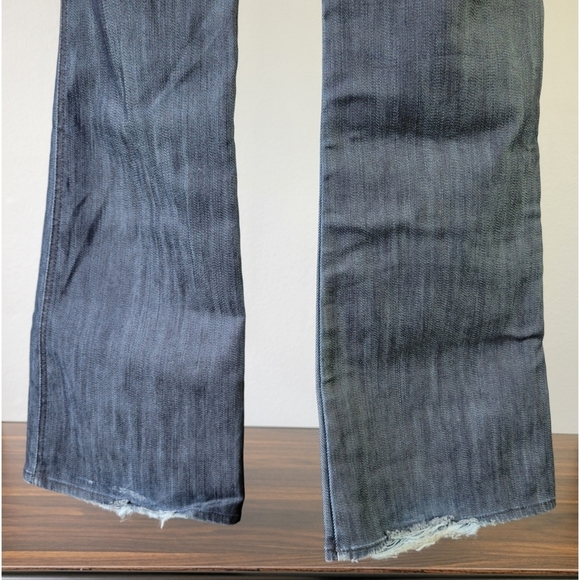 7 FOR ALL MANKIND // A pocket distressed mid-rise boot-cut stretch denim jeans - Picture 6 of 12